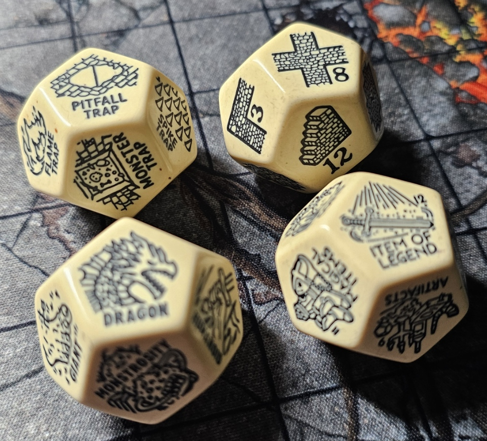 Four large chunky bone-colored random generator dice resting on a dark gaming mat. Each die shows fantasy-themed symbols including Dragon, Giant, Monstrosity, and dungeon features in vintage parchment style.